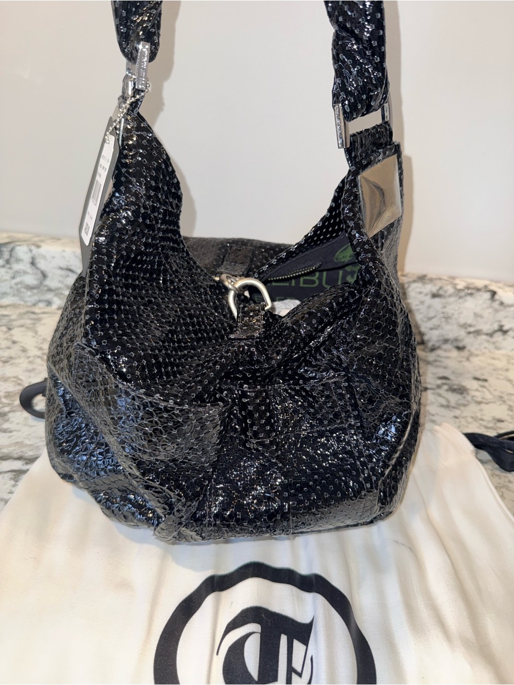 Tylie Malibu patent leather hobo bag